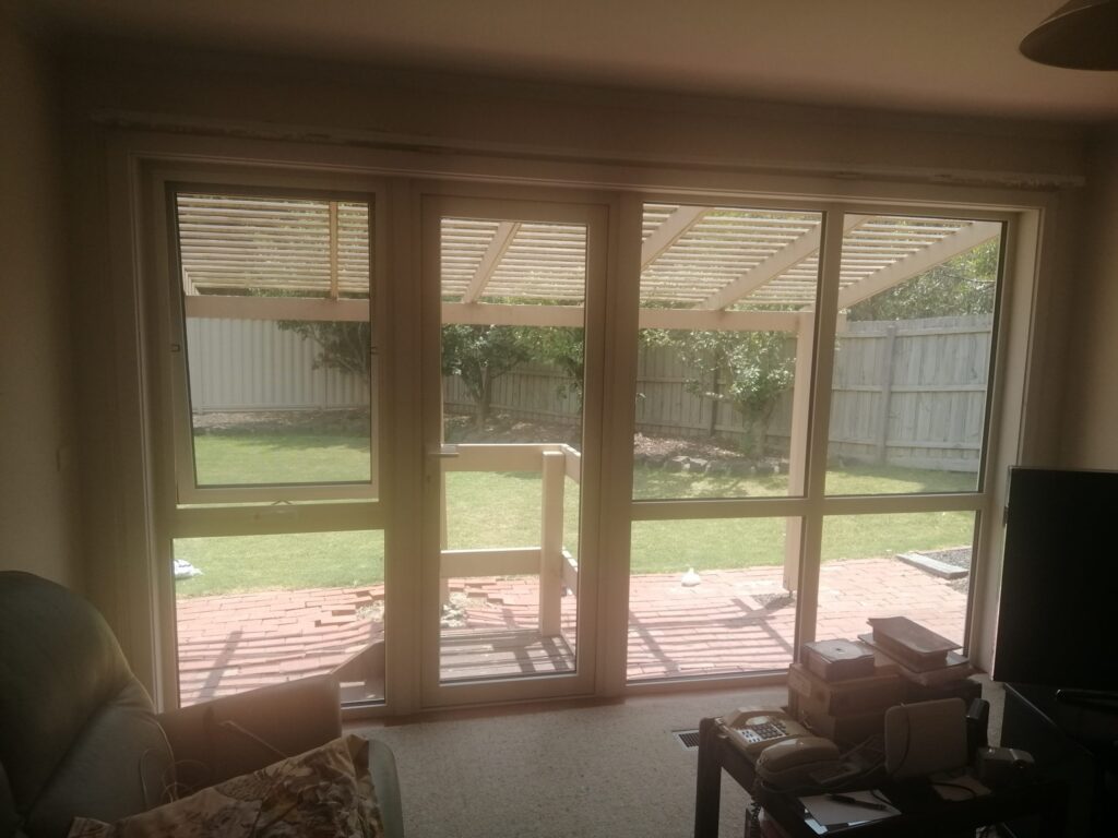 UPVC Stacking Doors with woodgrain frame in Keilor at APS Double Glazing