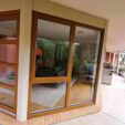 UPVC Awning Window with woodgrain frame at APS Double Glazing
