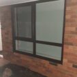 UPVC Awning Window with Anthracite Grey frame at APS Double Glazing