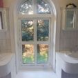 Shaped Windows with white frame at APS Double Glazing