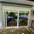 Sliding and Patio Doors outside with white frame at APS Double Glazing