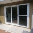 Stacking Doors with white frame at APS Double Glazing