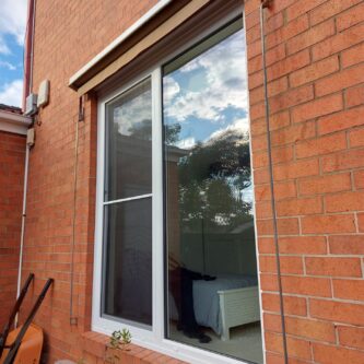 UPVC Sliding window outside at APS Double Glazing