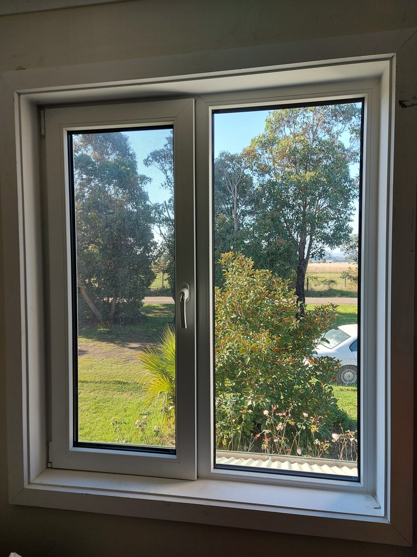 UPVC tilt turn windows energy efficient double glazed glass front view at APS Double Glazing
