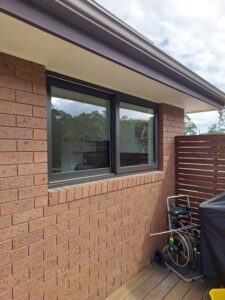 Fixed-picture-windows-with-energy-efficient-double-glazed-glass-units-in-black-exterior-UPVC-frames-Kitchen